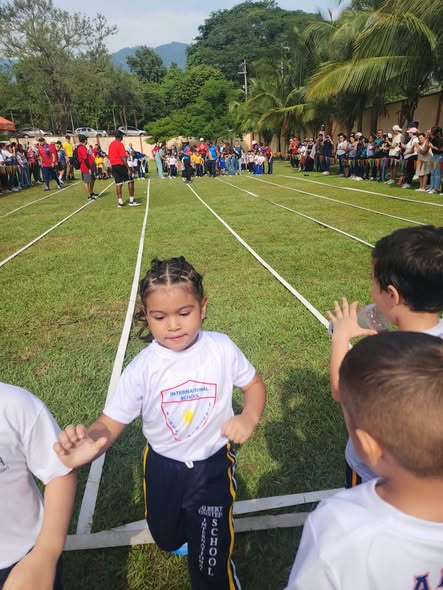 AEIS kindergarten students at an outdoor running event
